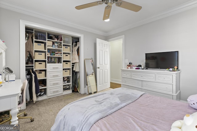 bedroom with a closet, ceiling fan, ornamental molding, and light colored carpet