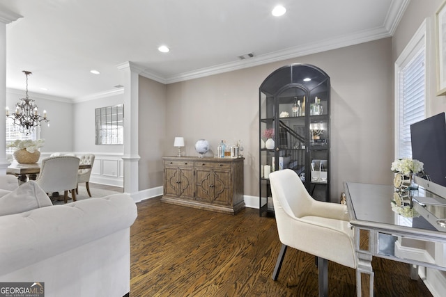 office space with dark hardwood / wood-style floors, an inviting chandelier, and a wealth of natural light