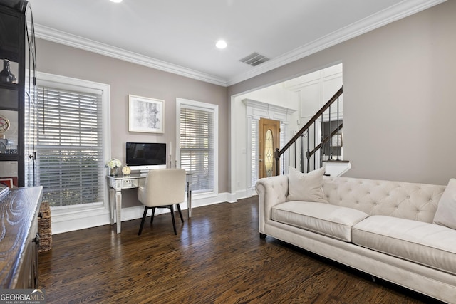 living room featuring dark hardwood / wood-style flooring and ornamental molding