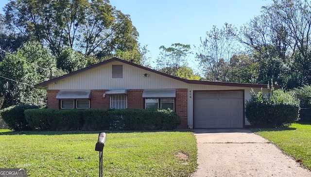 single story home featuring a garage and a front lawn