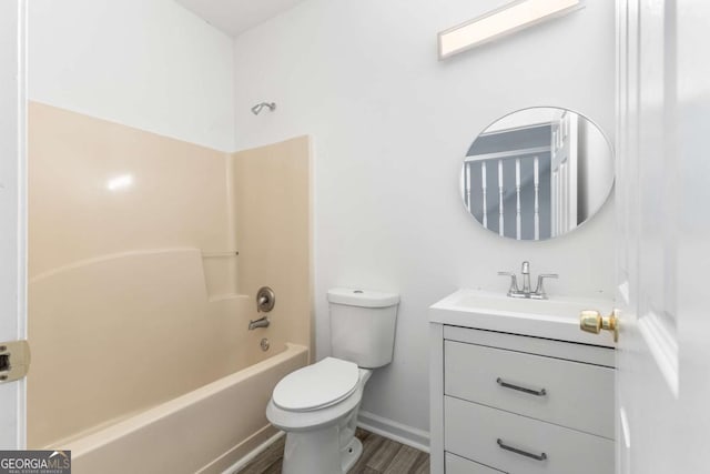 full bathroom featuring vanity,  shower combination, toilet, and wood-type flooring