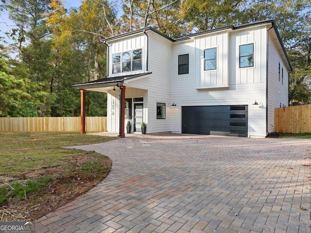 view of front of property with a garage