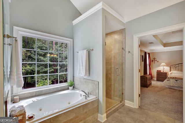 bathroom featuring tile patterned flooring, shower with separate bathtub, and ornamental molding