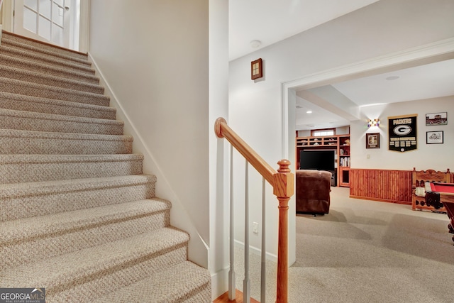 staircase with carpet