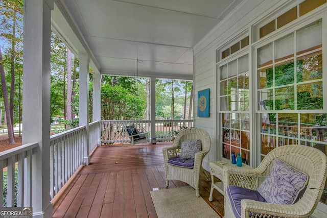 deck featuring covered porch