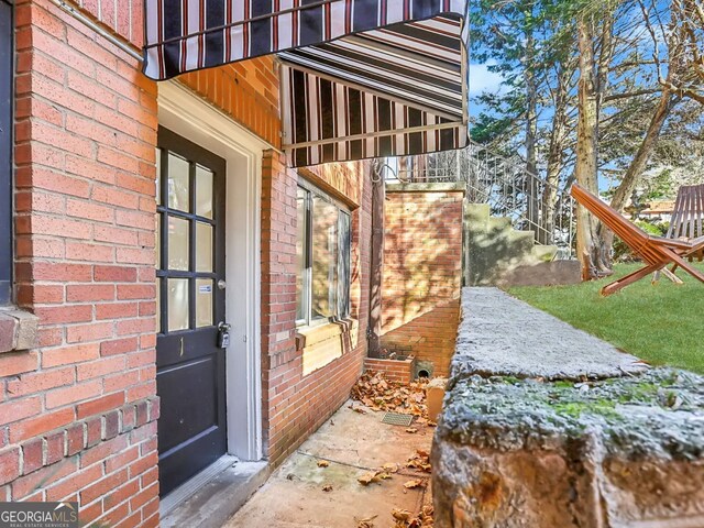 320 3rd St NE Unit 1, Atlanta, GA 30308 - property entrance featuring brick siding
