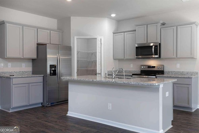 kitchen with stainless steel appliances, gray cabinets, and sink