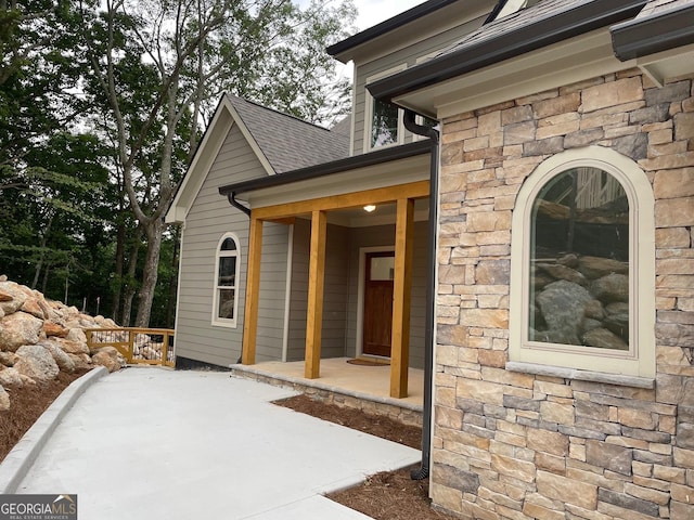 doorway to property featuring a patio area