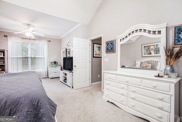 bedroom featuring ceiling fan, lofted ceiling, light carpet, and ornamental molding