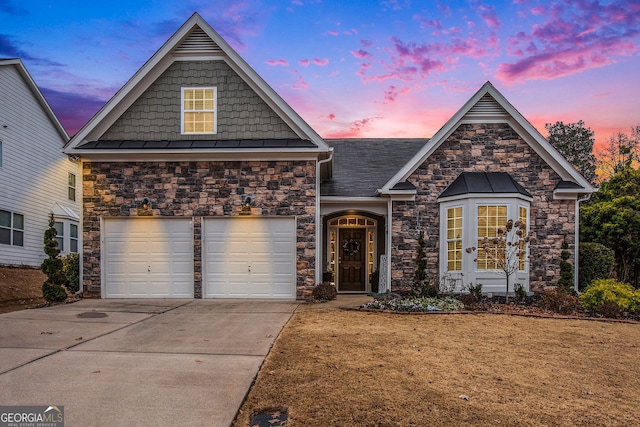 view of front of home featuring a garage