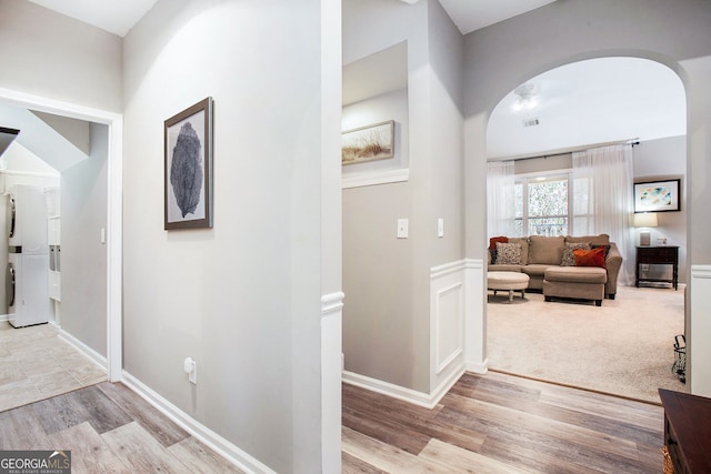 hall with light wood-type flooring