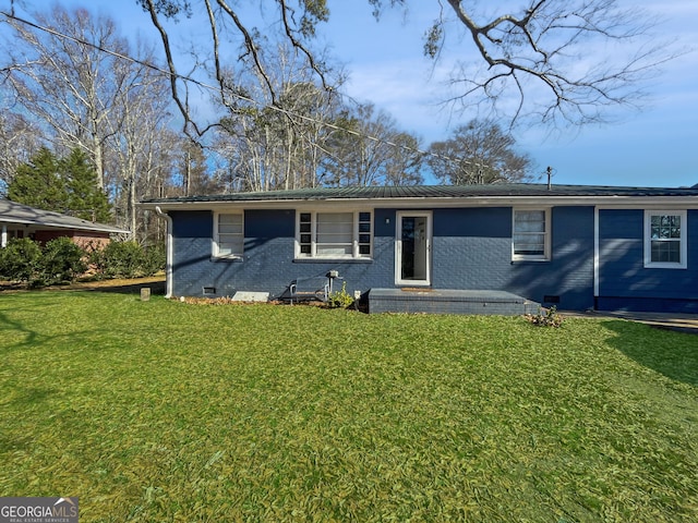 ranch-style home with a front yard