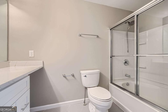 full bathroom with tile patterned flooring, vanity, toilet, and bath / shower combo with glass door