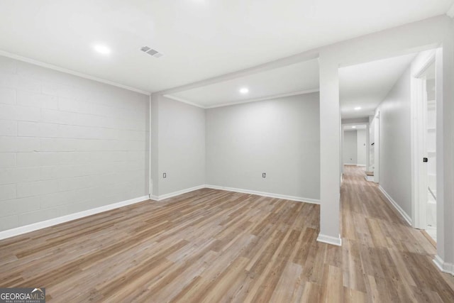 unfurnished room with light wood-type flooring