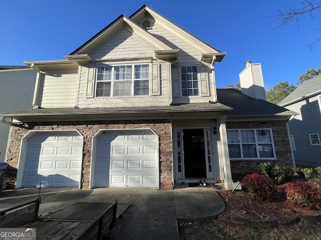 view of front of house with a garage