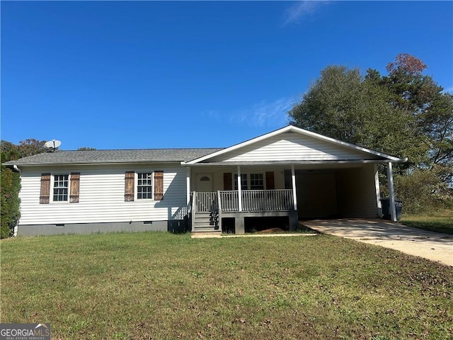 view of front of property with a carport, covered porch, and a front lawn