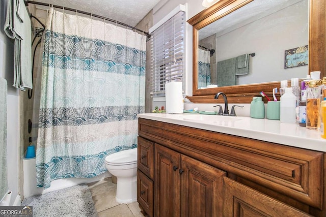 full bathroom featuring vanity, shower / bath combination with curtain, a textured ceiling, and toilet