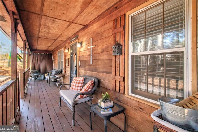 wooden deck with a porch