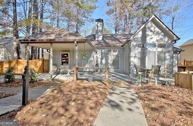 view of front of house with a patio area