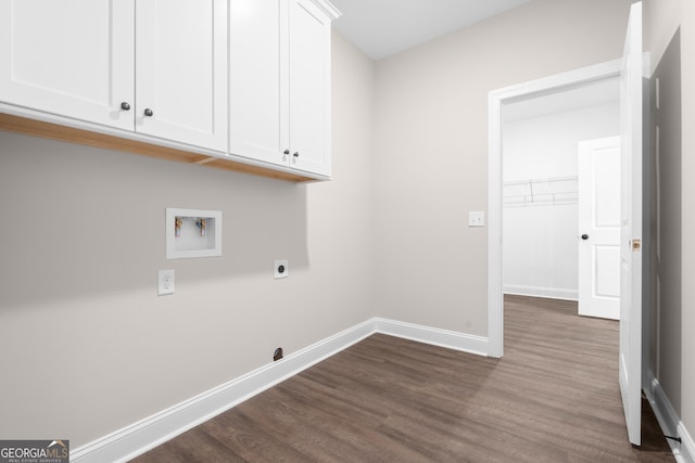 laundry room with washer hookup, cabinets, dark hardwood / wood-style flooring, and electric dryer hookup