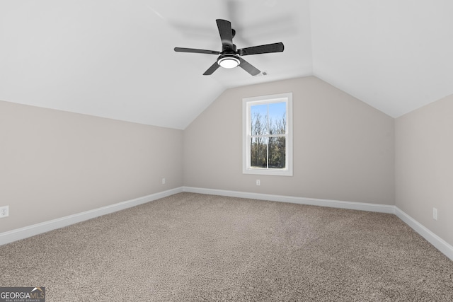 bonus room with ceiling fan, carpet, and lofted ceiling