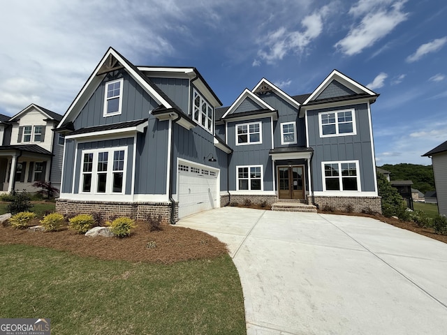 5613 Meadow View Dr, Jefferson, GA 30549 - craftsman inspired home with an attached garage, board and batten siding, brick siding, and concrete driveway