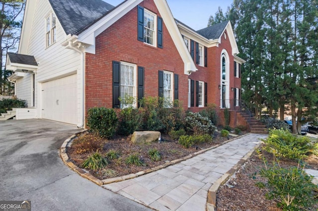 view of property exterior featuring a garage