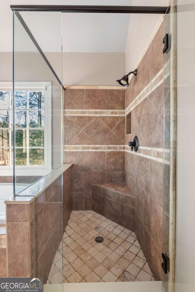 bathroom with an enclosed shower