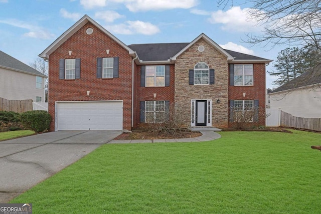 view of front of property with a front lawn and a garage