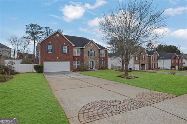 view of front of home featuring a front yard and a garage