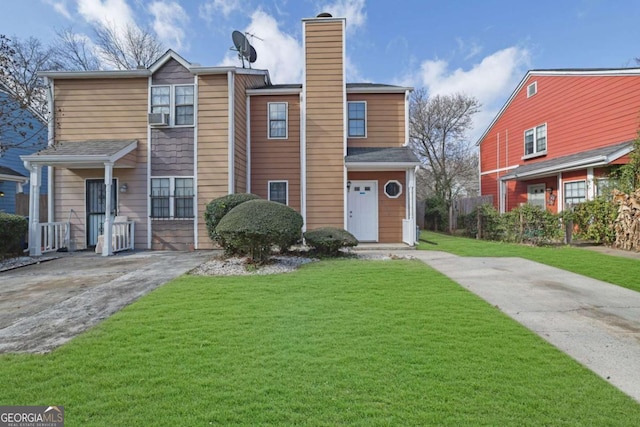 view of front facade with a front lawn