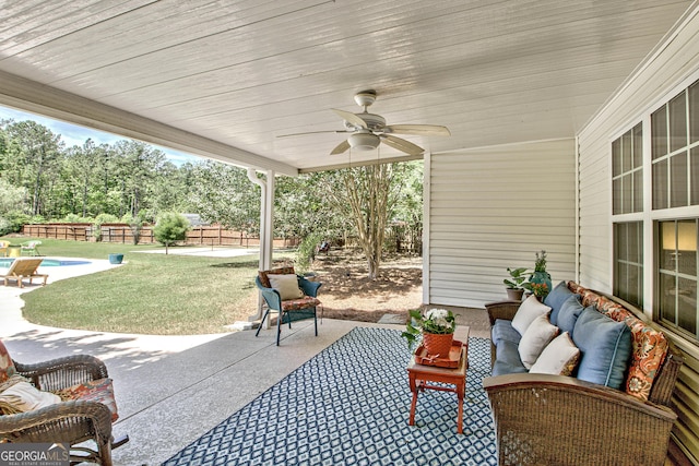 view of patio / terrace with ceiling fan and an outdoor hangout area