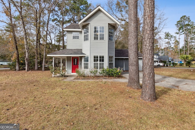 view of front facade featuring a front yard and a porch