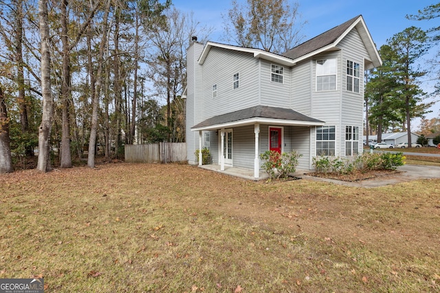 front facade with a front lawn