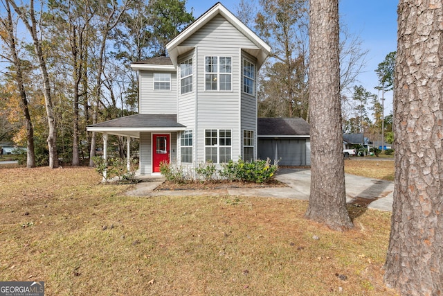 view of front of property with a front lawn