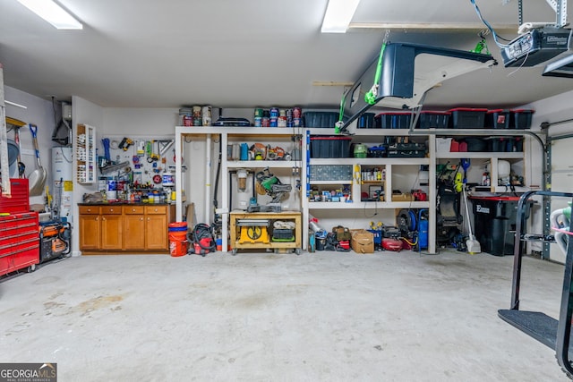 garage with a workshop area and a garage door opener