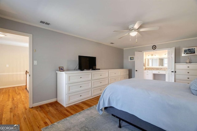 bedroom with connected bathroom, ceiling fan, light hardwood / wood-style flooring, and ornamental molding