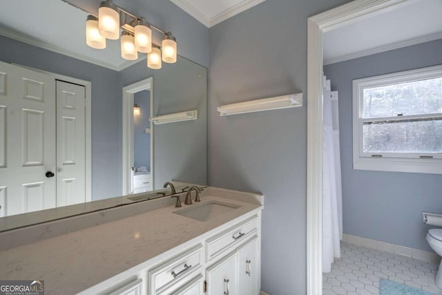 bathroom with tile patterned floors, a chandelier, toilet, vanity, and ornamental molding