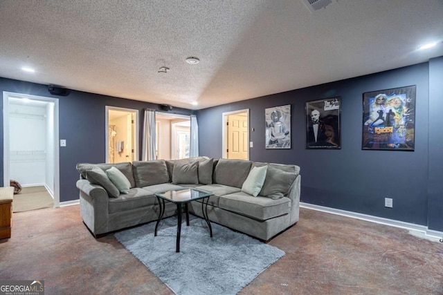 living room featuring a textured ceiling