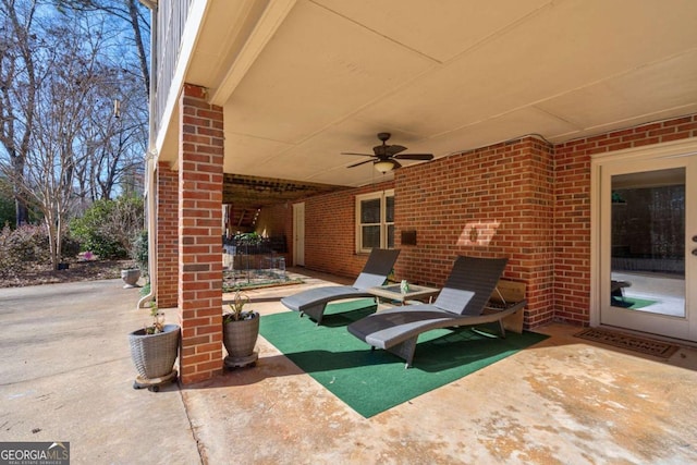 view of patio / terrace featuring ceiling fan