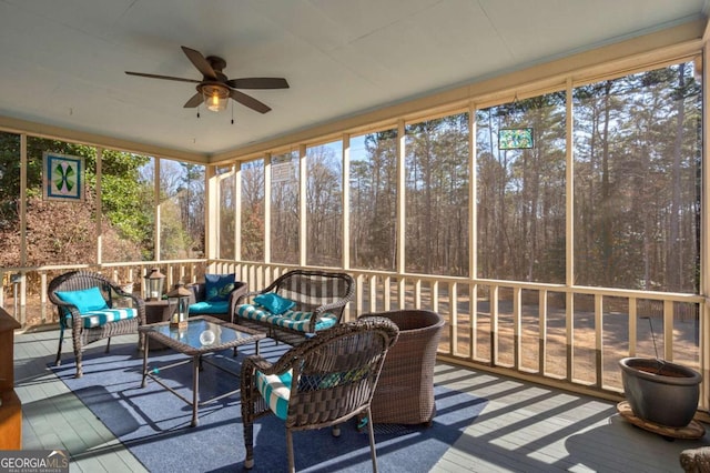 sunroom / solarium with ceiling fan