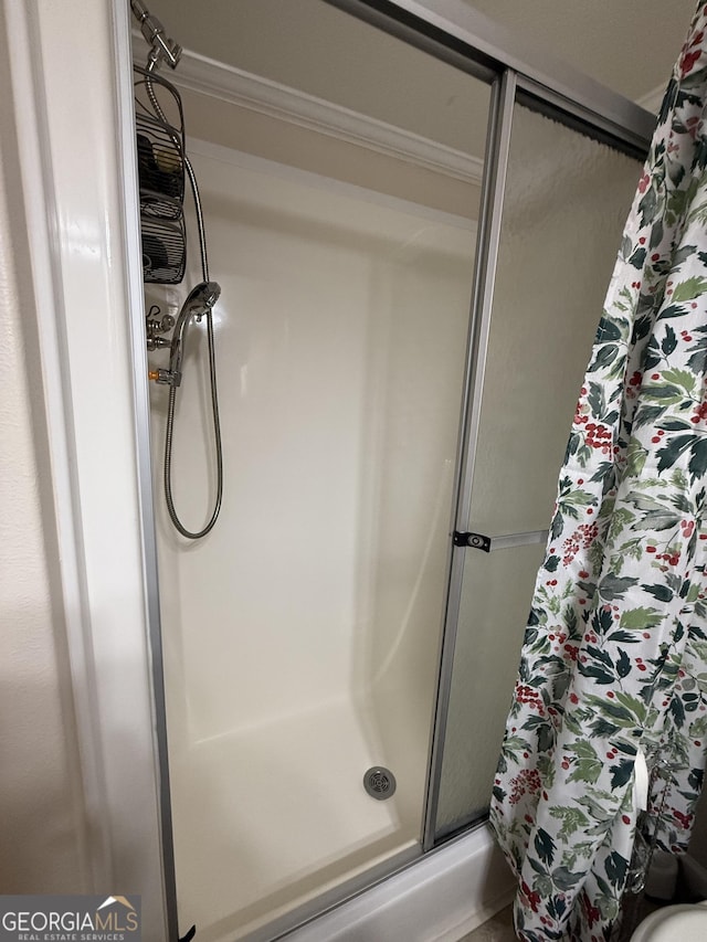 bathroom with a shower