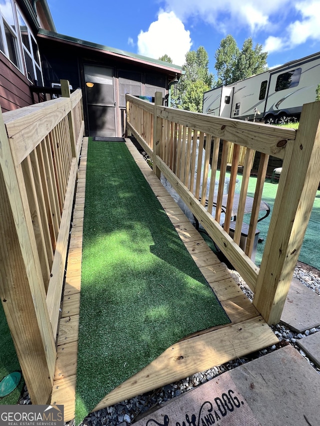 view of yard with a wooden deck