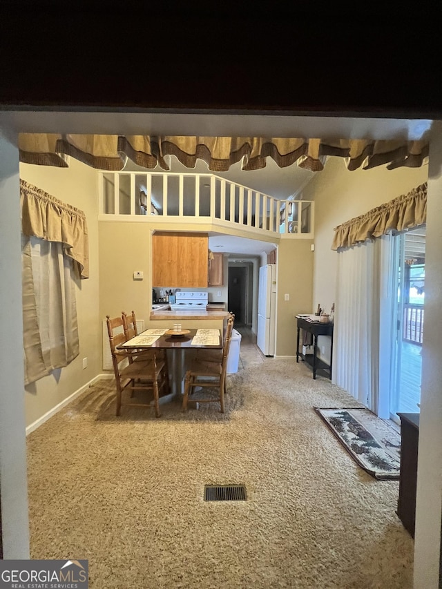 view of carpeted dining room