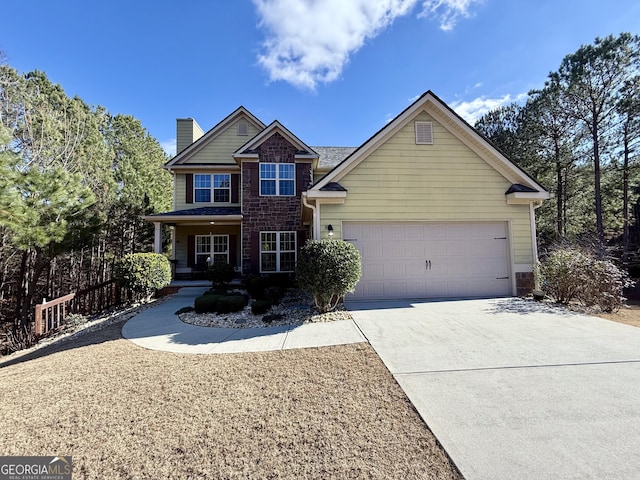 view of front of property featuring a porch and a garage