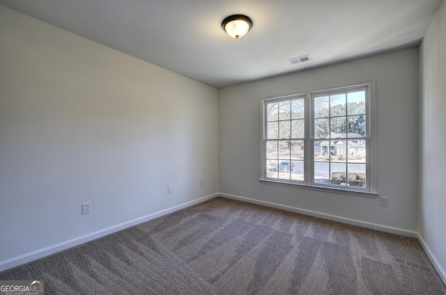 empty room featuring carpet