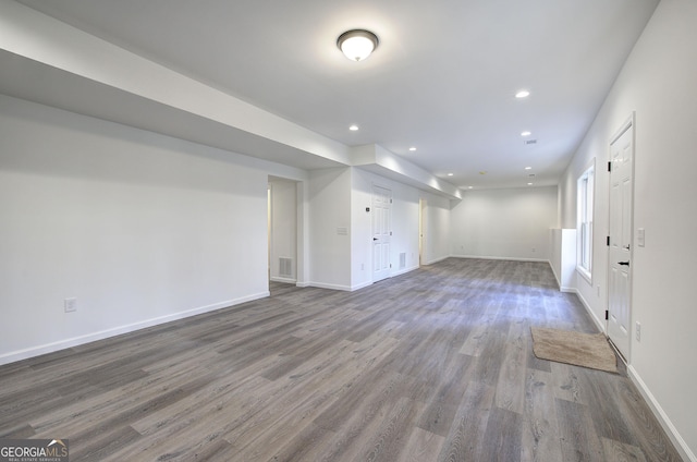 basement featuring hardwood / wood-style floors