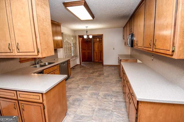 kitchen with pendant lighting, sink, an inviting chandelier, appliances with stainless steel finishes, and a textured ceiling