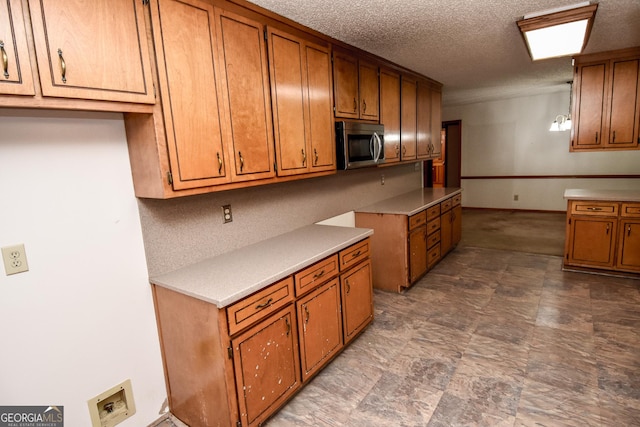 kitchen with a textured ceiling