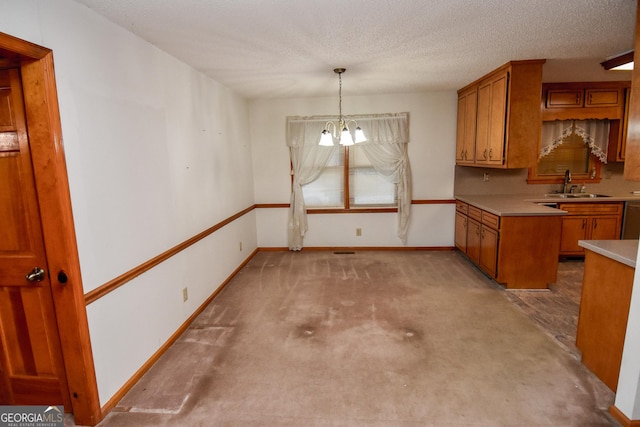 kitchen with decorative light fixtures, sink, a notable chandelier, light colored carpet, and stainless steel dishwasher